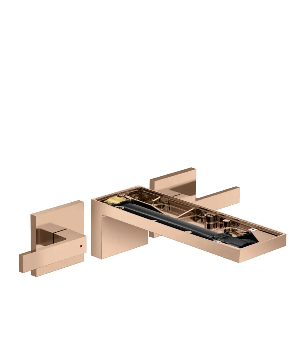 AXOR Waschtischarmatur in Roségold-Optik mit zwei Bedienelementen und einem länglichen Auslauf für die Wandmontage.